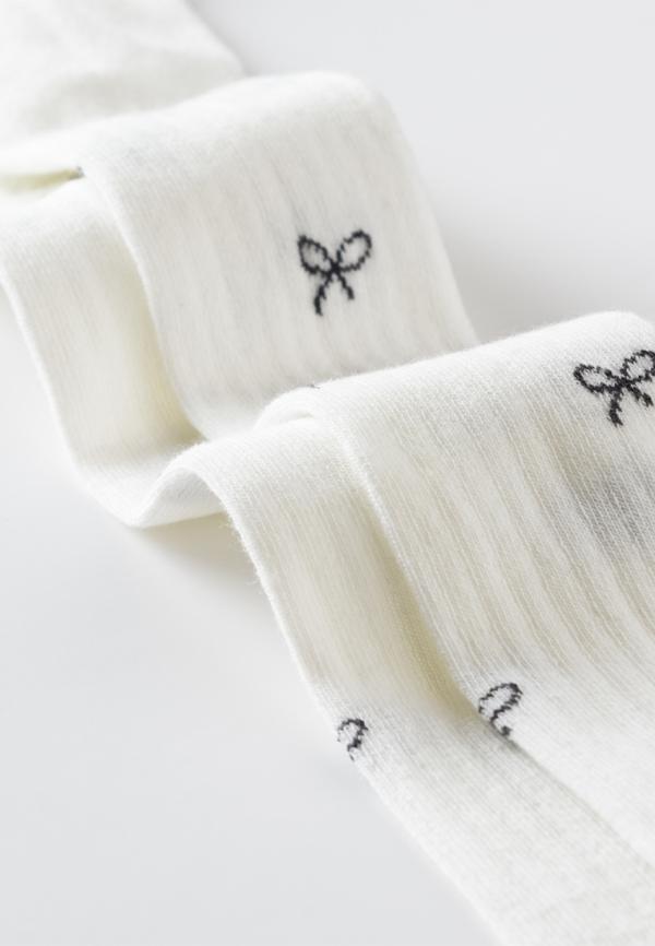 картинка Колготки для девочки Artie 2d970 Молочный от магазина детских товаров ALiSa